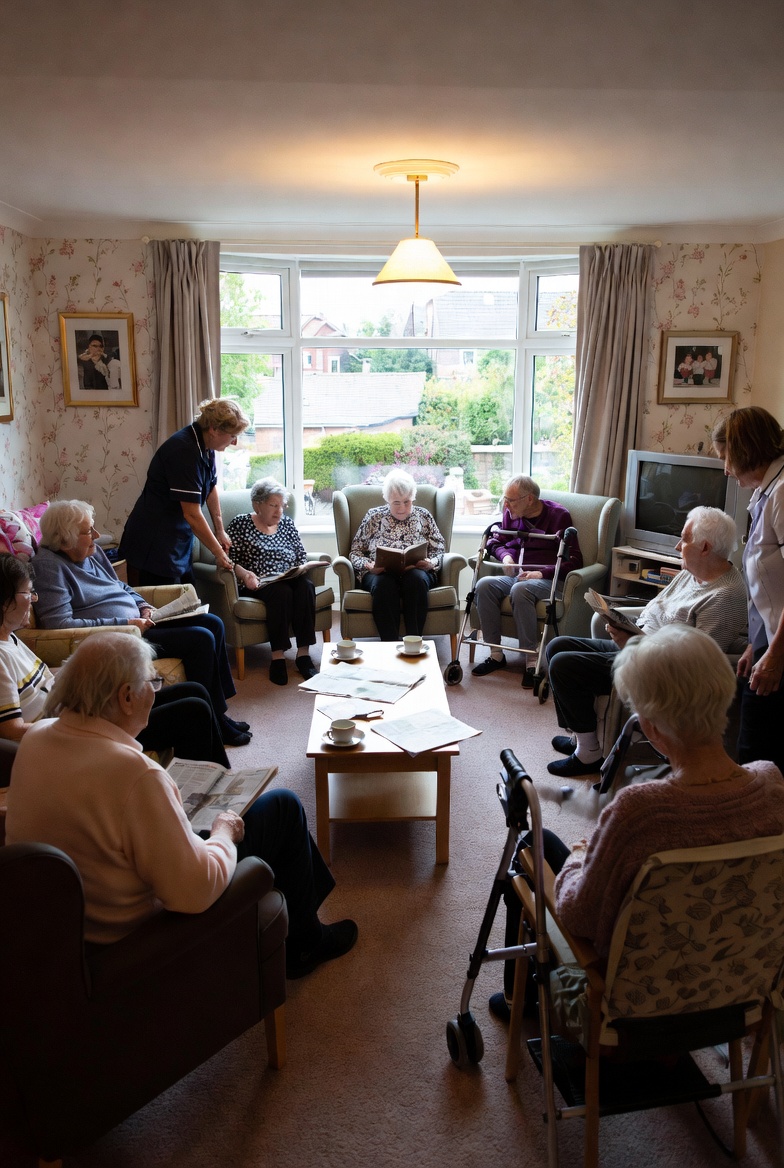 Residents relaxing in the communal lounge at Babylon Health